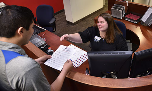 Staff helping student