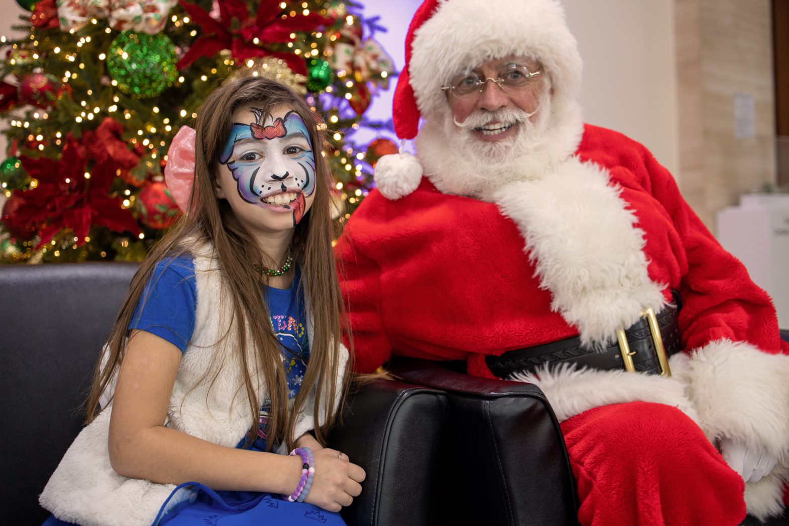 Child Posing with Santa