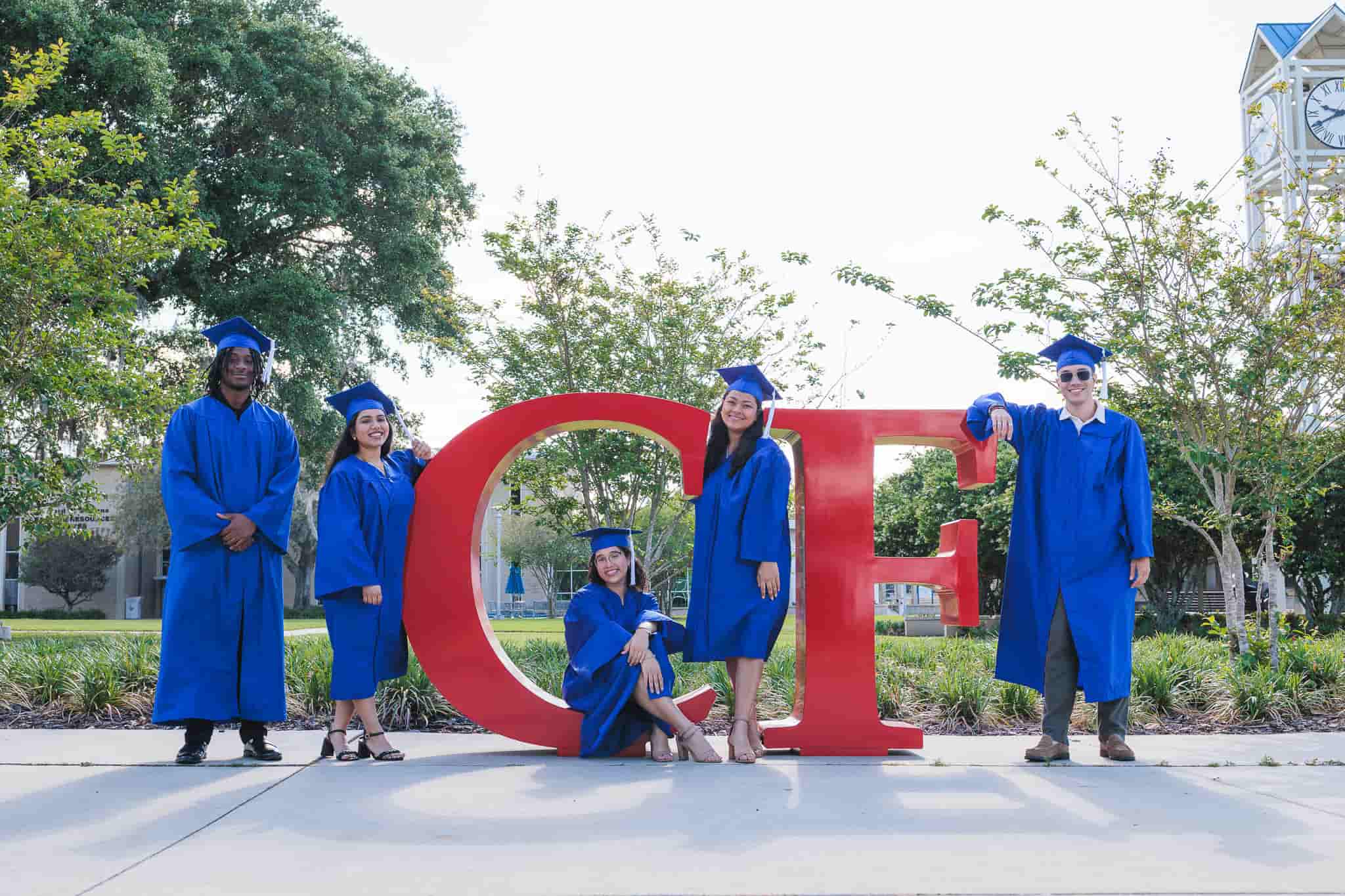 Graduates around CF letters
