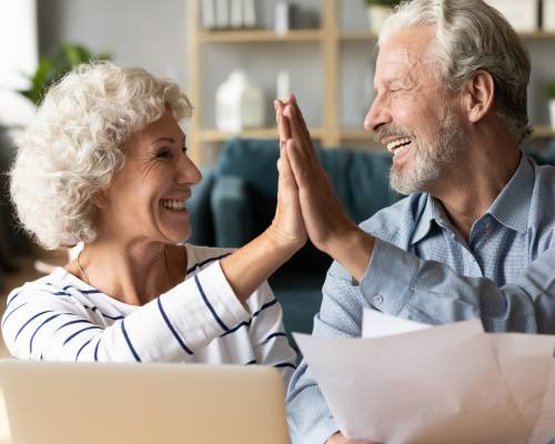 Elderly Couple High Fiving